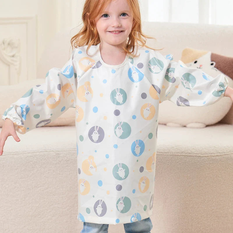 Pink long-sleeved feeding bib, folded compactly for portable baby feeding essentials.