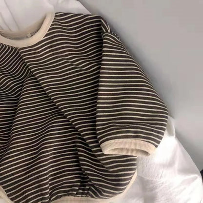 Unisex kids' black & white striped long sleeve t-shirt, versatile baby fashion item. 90 characters