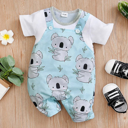 Baby in gender-neutral koala print romper, soft cotton, full-length for infants