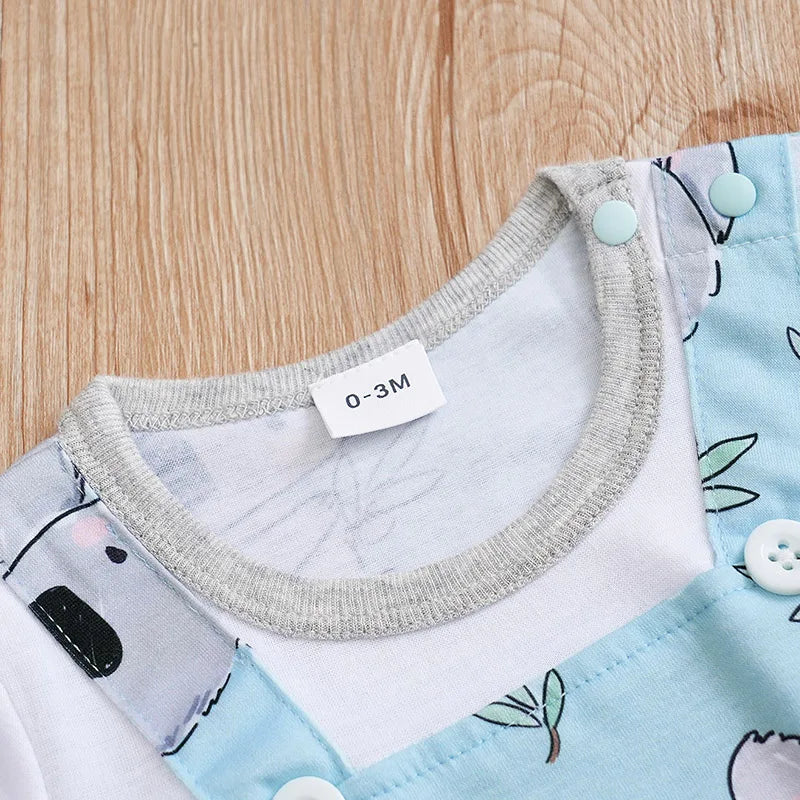 Newborn wearing a white koala print baby romper, comfortable and breathable infant apparel