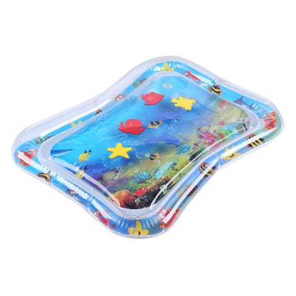 Close-up of baby on tummy time water play mat, observing swimming fish, a fun and engaging infant toy.