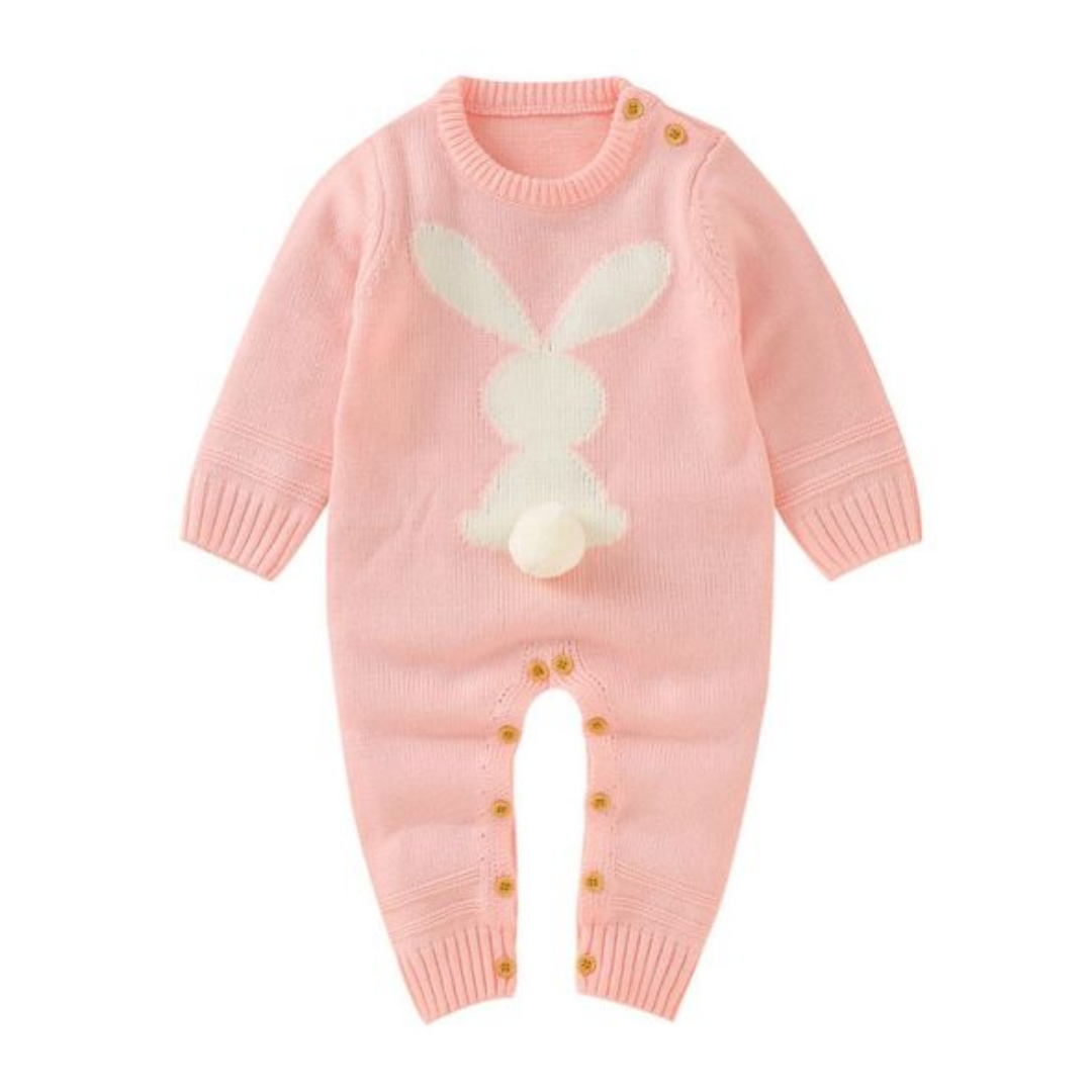 Cotton baby romper in white with black bunny silhouettes, designed for comfort and style for baby boys or girls.