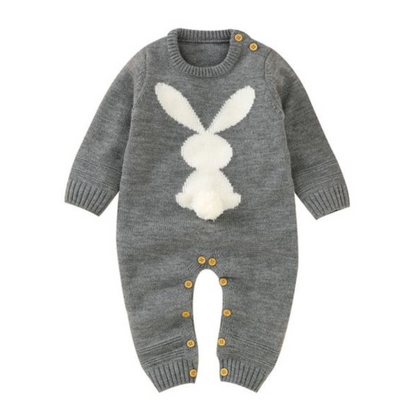 Baby boy or girl in a comfortable long sleeve bunny print romper, suitable for everyday play.