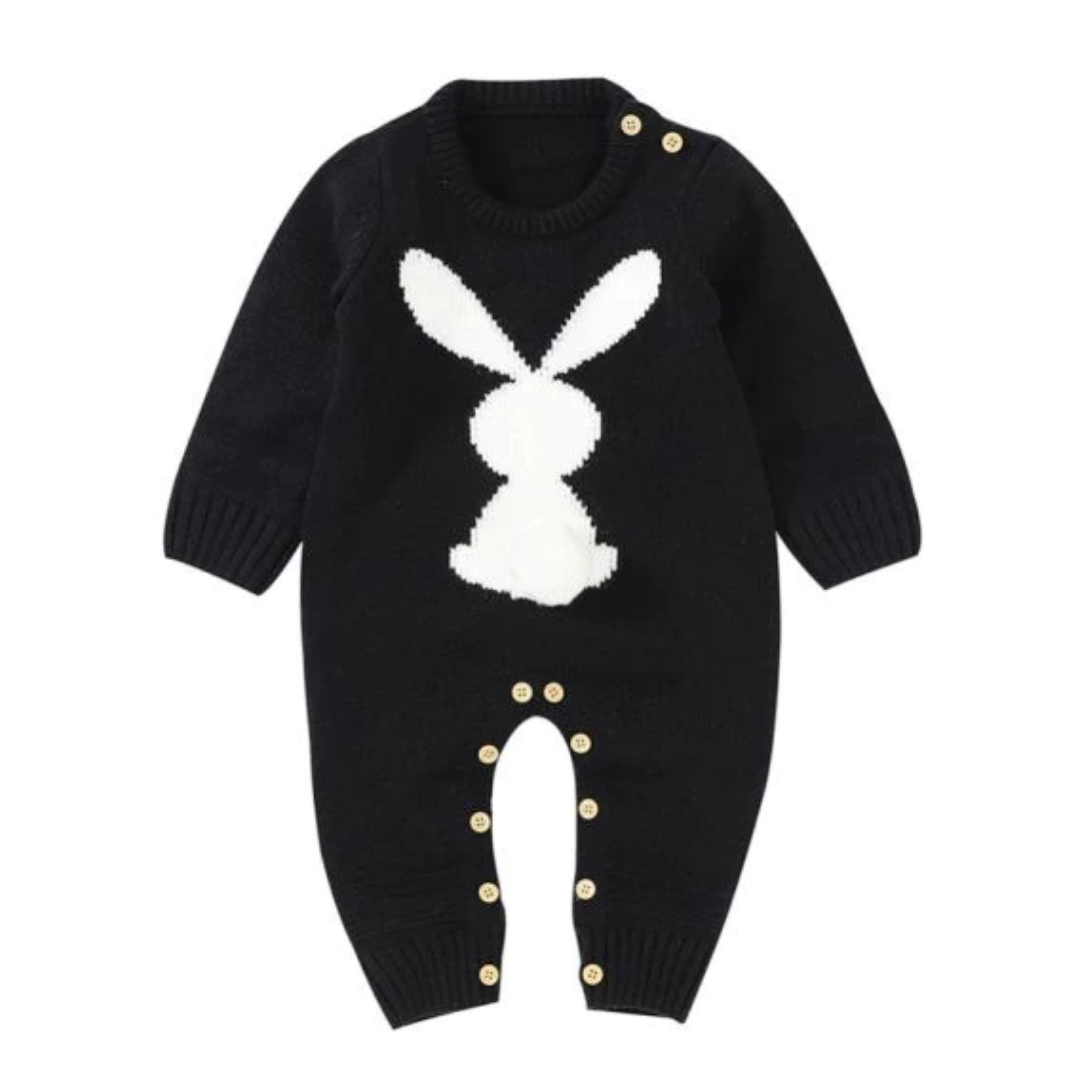 Full view of a long sleeve baby jumpsuit with a repeated bunny silhouette pattern, a charming unisex design.