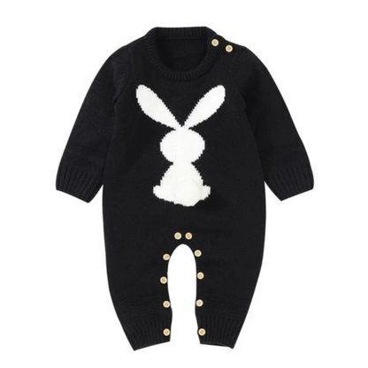 Full view of a long sleeve baby jumpsuit with a repeated bunny silhouette pattern, a charming unisex design.