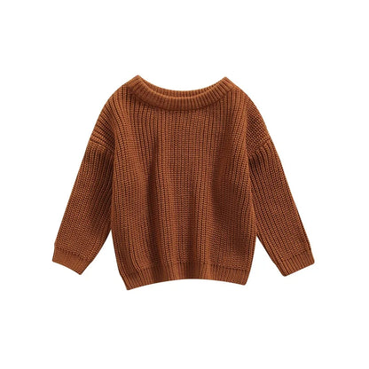 Knitted long sleeve sweater laid flat, highlighting its all-season design and quality.