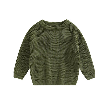 Close-up of the neckline of a knitted baby pullover, showing fine detail and comfort.