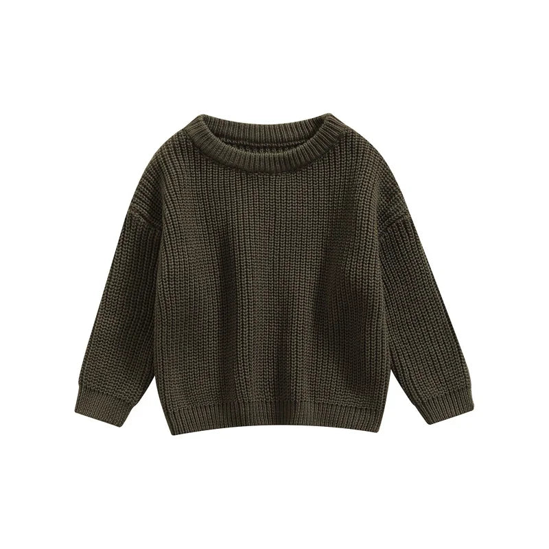 Toddler playing in a blue knitted long sleeve top, durable and comfortable infant apparel.
