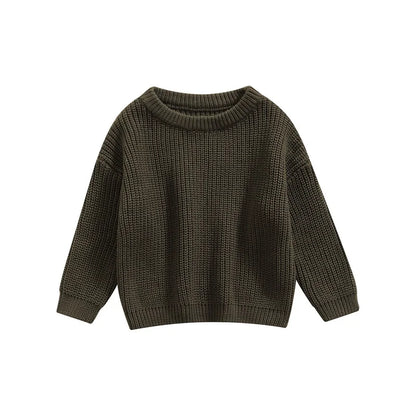 Toddler playing in a blue knitted long sleeve top, durable and comfortable infant apparel.