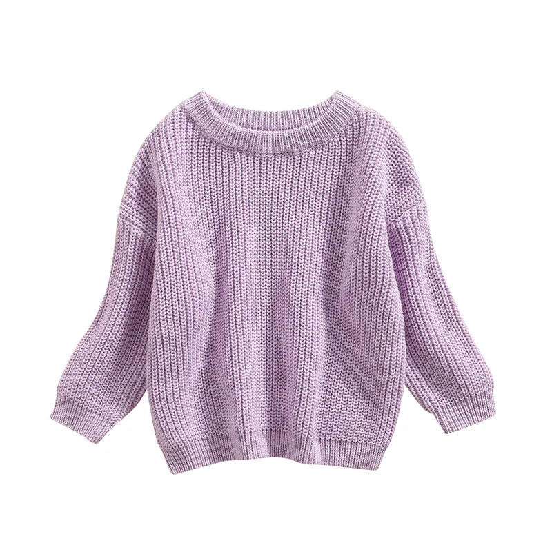 Collection of unisex baby knitted sweaters in different sizes for infants and toddlers.