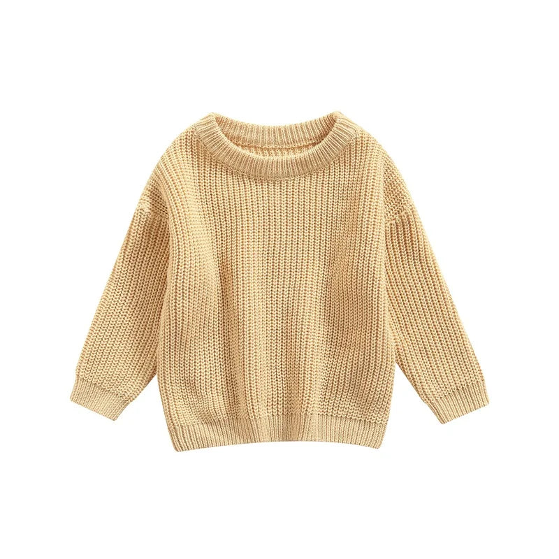 Folded cotton blend baby sweater, showcasing its soft and cozy material for infants.