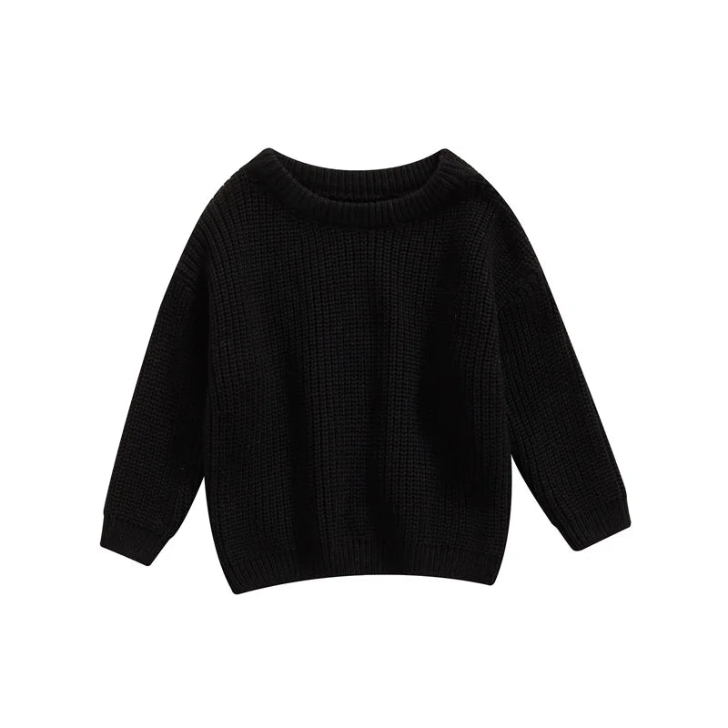 Detail of ribbed cuffs on a knitted long sleeve pullover, perfect for baby clothes.