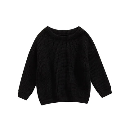 Detail of ribbed cuffs on a knitted long sleeve pullover, perfect for baby clothes.