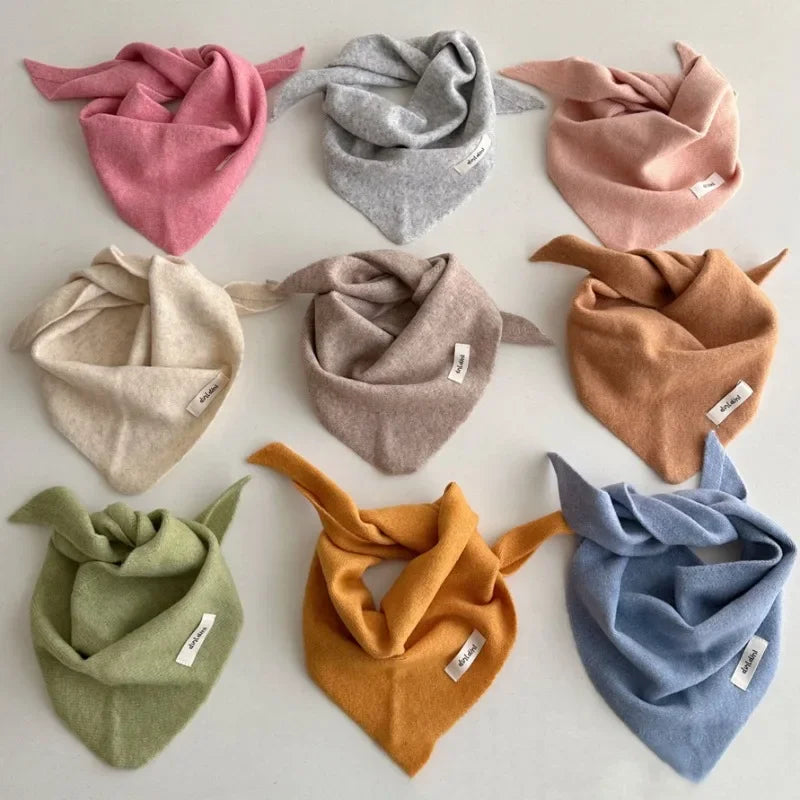 Soft knitted baby neckerchief, triangle design, unisex, perfect for cold weather.