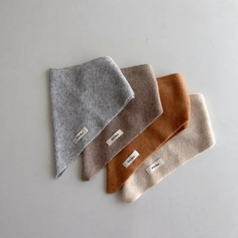 Warm cashmere-feel triangle scarf for kids, comfortable and stylish winter accessory.