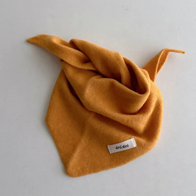 Warm baby triangle scarf in a neutral color, knitted, cashmere-feel comfort.