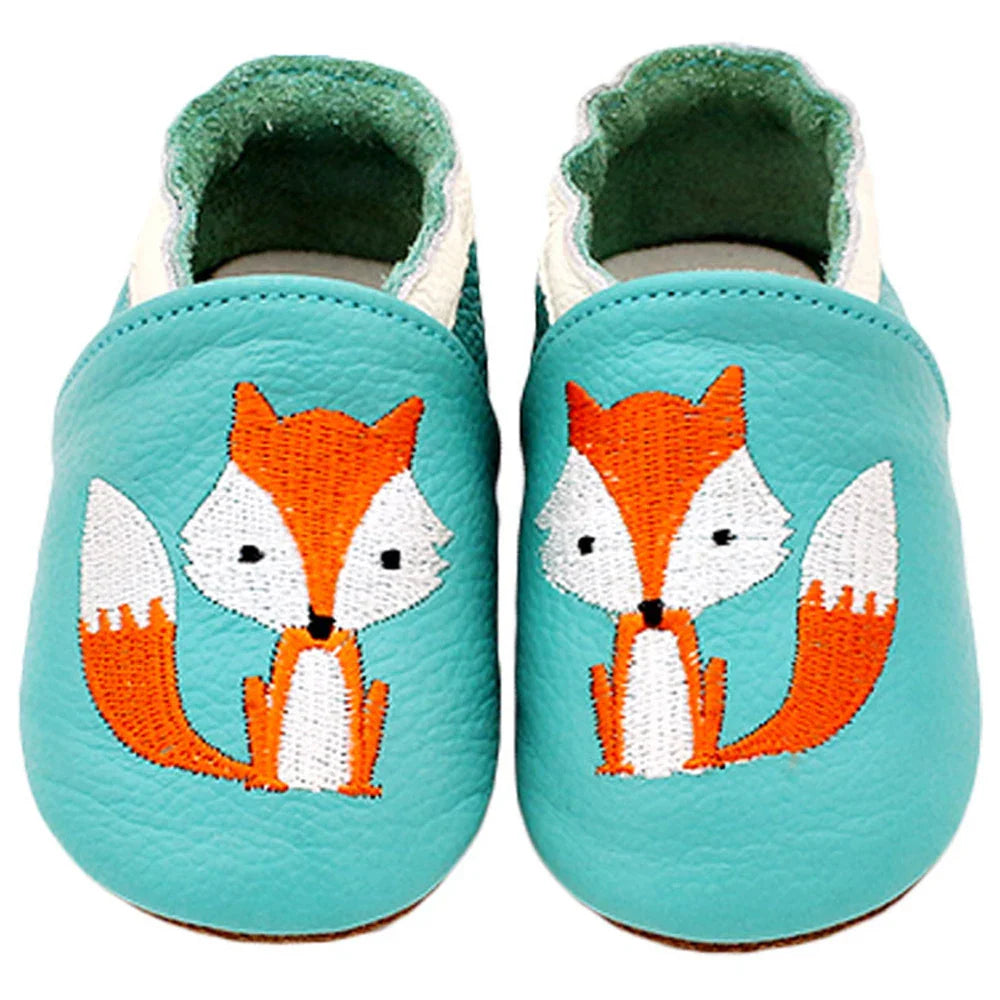 Soft sole baby slippers made of genuine leather, designed for comfort and flexibility