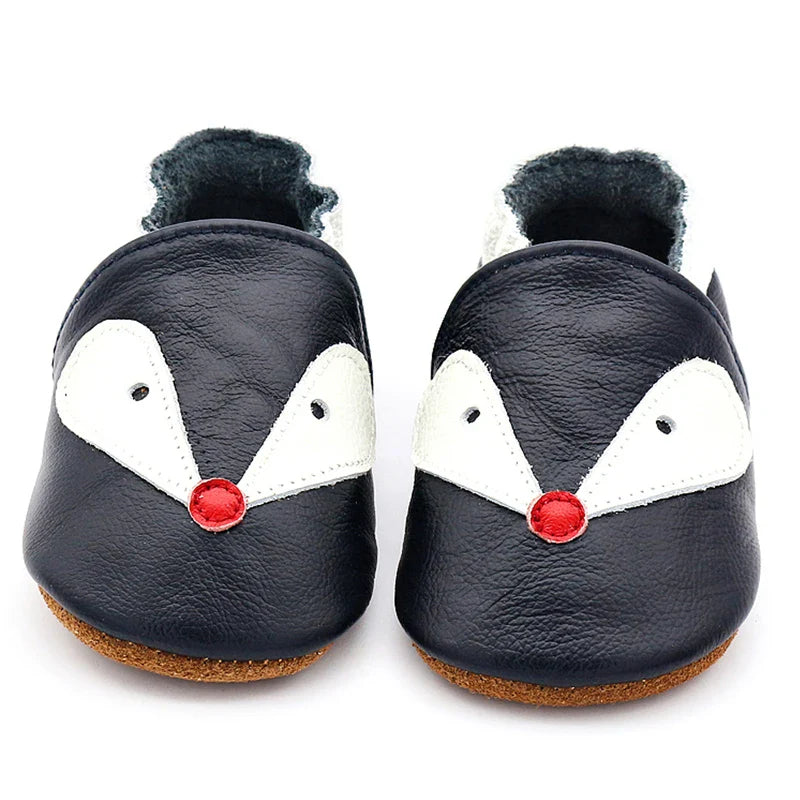 Infant footwear: yellow leather moccasins with an elastic ankle for secure fit