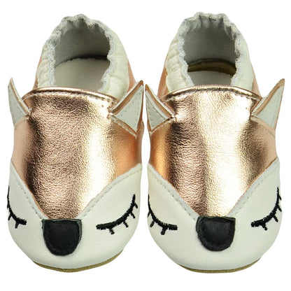 Genuine leather baby moccasins in various colors, grouped for display