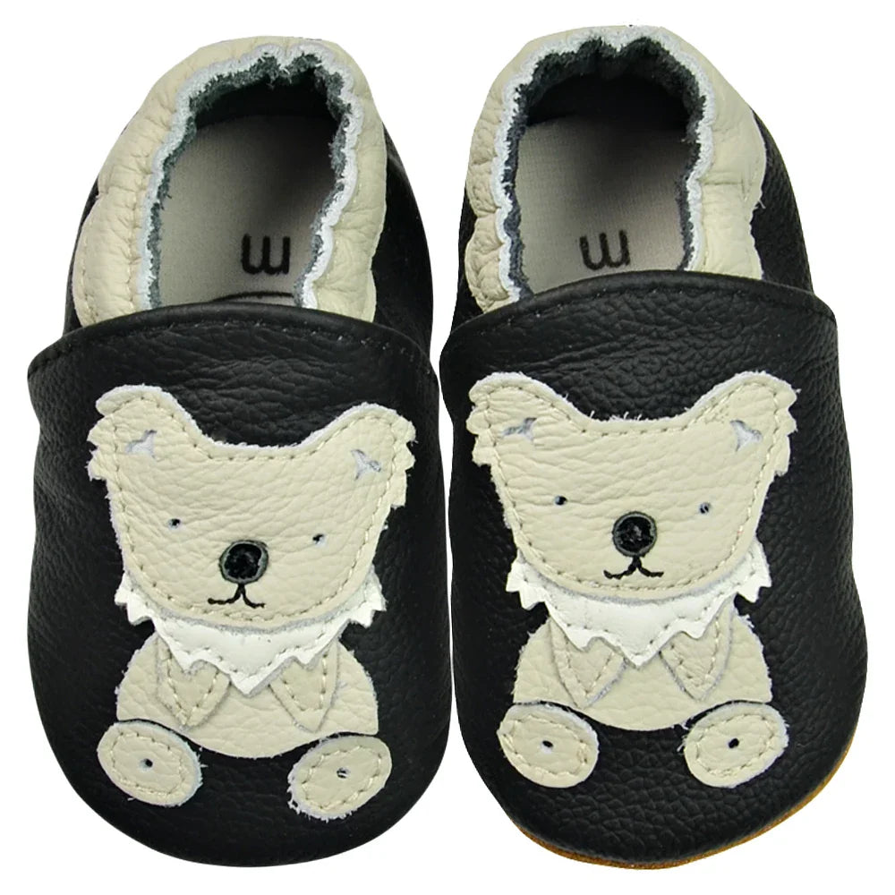 Newborn baby leather moccasins with an extra-soft sole, promoting foot development