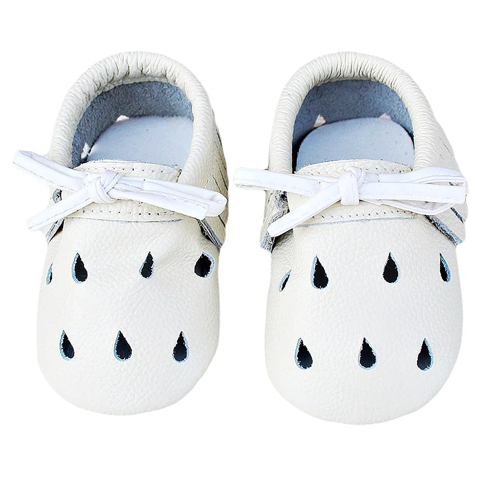 Baby soft sole slippers in yellow, providing warmth and protection for tiny feet