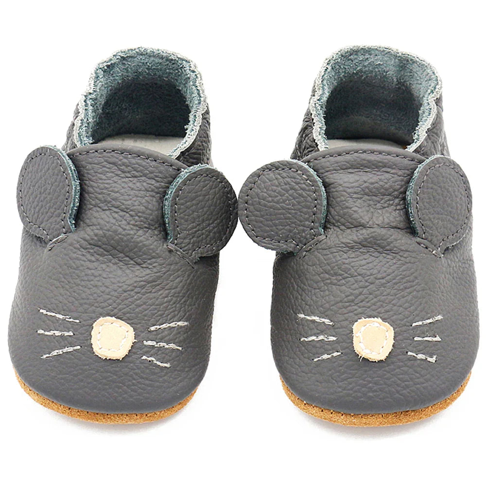 Purple infant leather soft sole shoes with an ergonomic design for growing feet