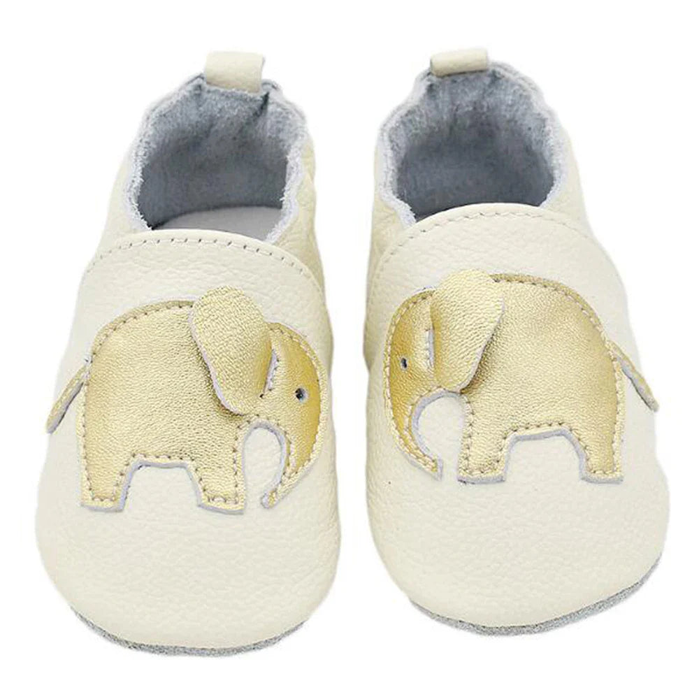 Assortment of genuine leather baby moccasins in different sizes and colors