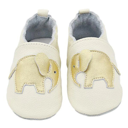 Assortment of genuine leather baby moccasins in different sizes and colors