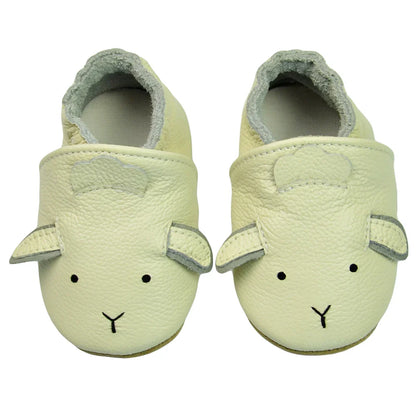 Pink genuine leather baby moccasins on a clean background, highlighting the color