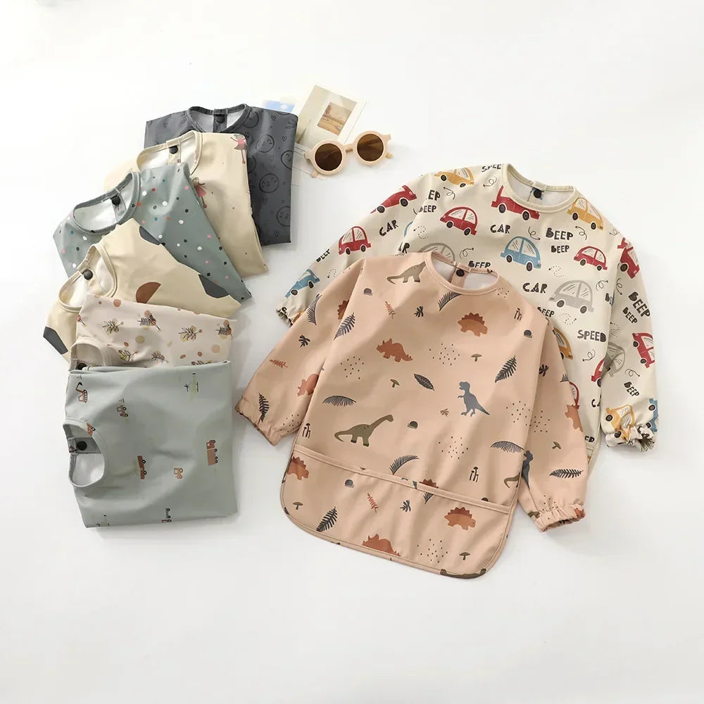 Baby long sleeve waterproof bib in a cute pattern for mess-free mealtime, easy to clean