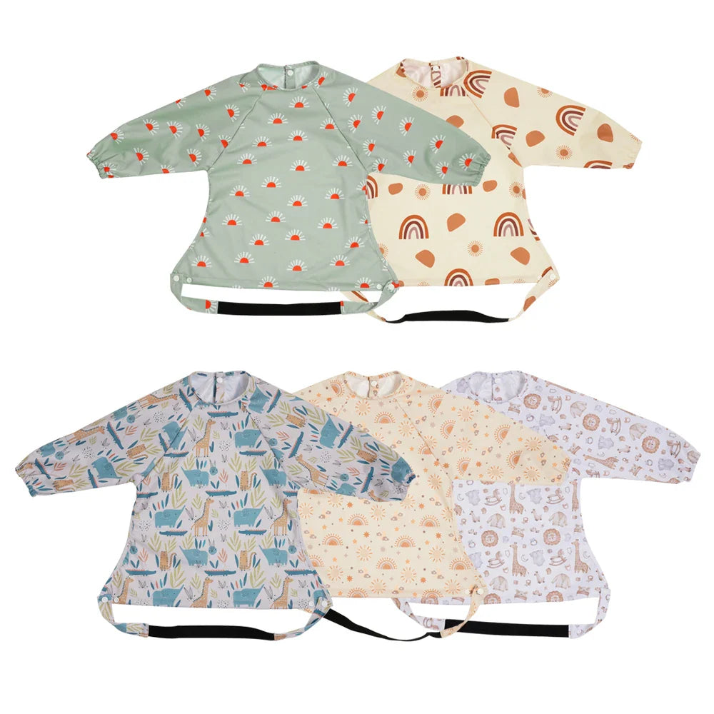 Baby mess proof long sleeve feeding bib with catch-all pocket, blue star print, waterproof PUL polyester