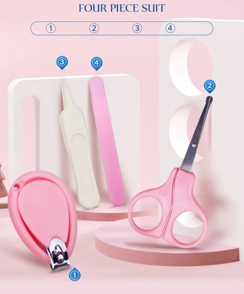 Hand holding a baby nail scissor from the kit, demonstrating its safe size for infant use