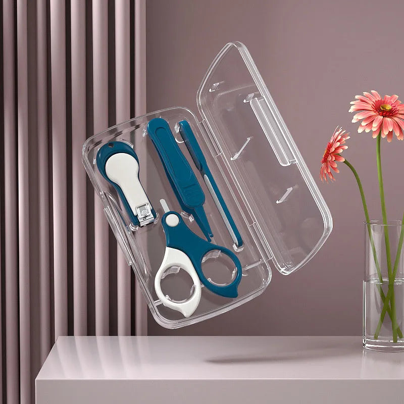 Pink baby nail care set, including clippers and scissors for gentle nail grooming.