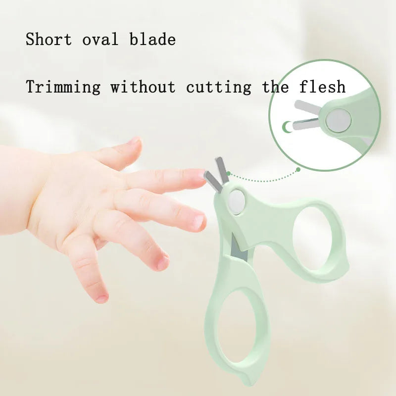 Close-up of baby nail clippers from a complete infant grooming and care set.