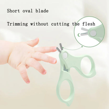 Close-up of baby nail clippers from a complete infant grooming and care set.