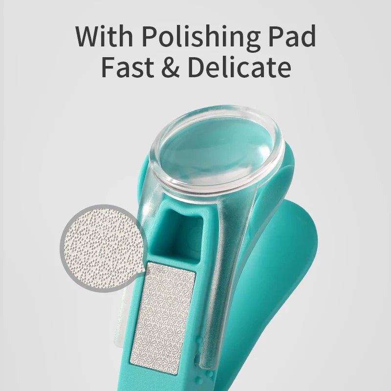 Baby nail clippers in a soft green with a built-in magnifier, essential for newborn hygiene.