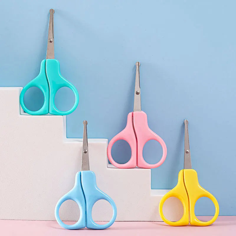Baby nail clippers with safety cover, designed for newborn care and infant grooming with precision.