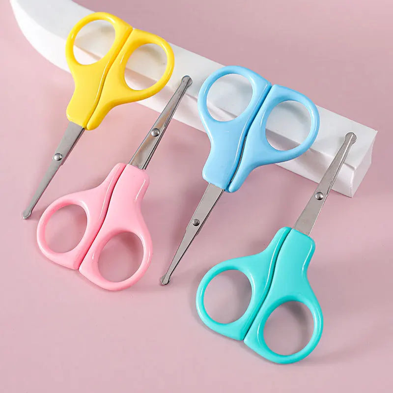 Gentle baby nail trimmer scissors, featuring rounded tips for safe and precise infant grooming.