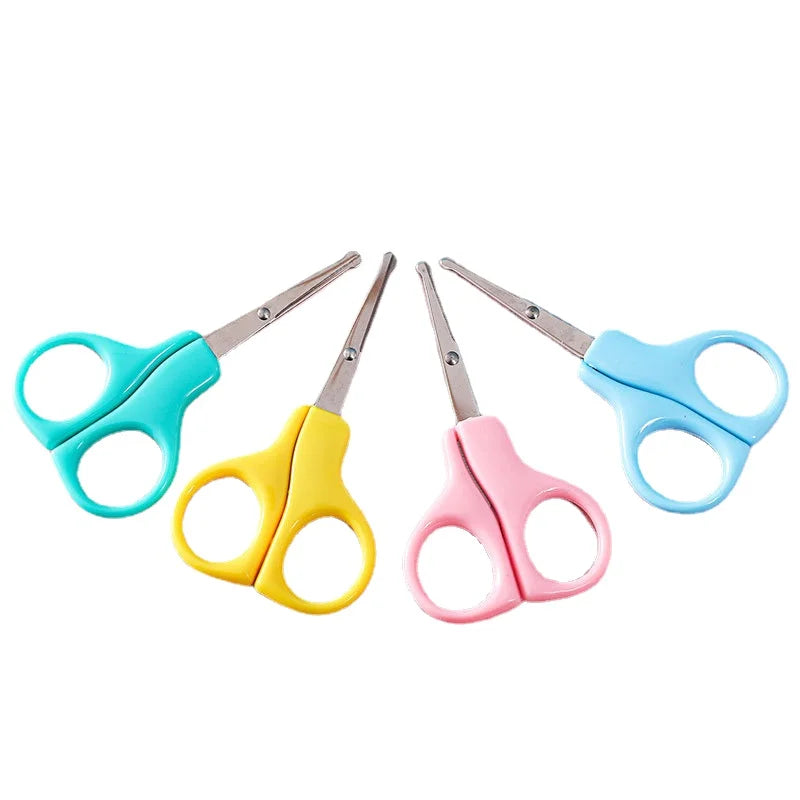 Baby grooming set including rounded tip safety scissors specifically for infant nails.