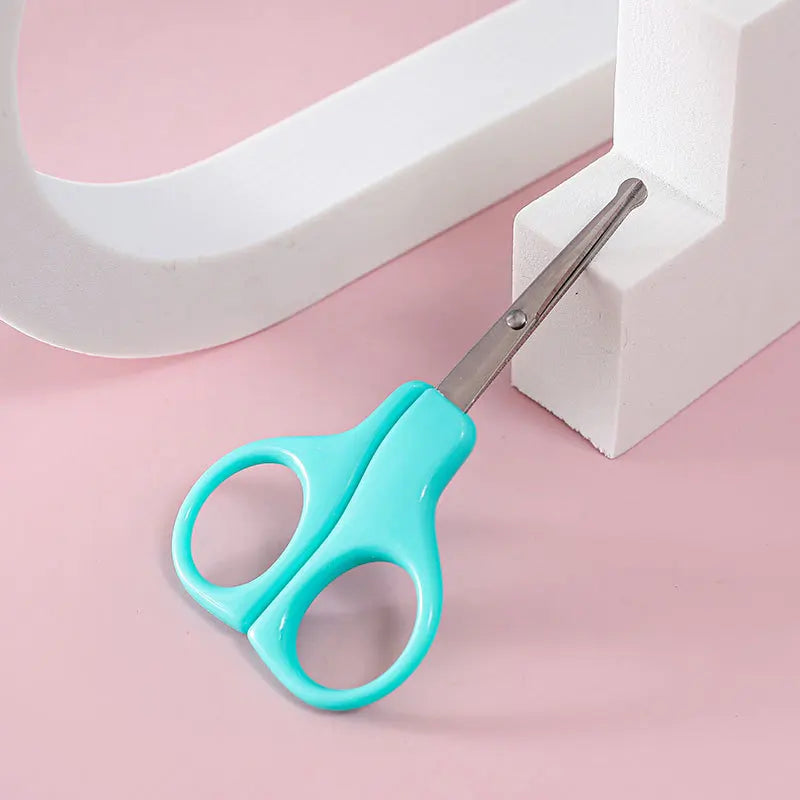 Ergonomic handle baby nail clippers for a comfortable and secure grip during newborn care.