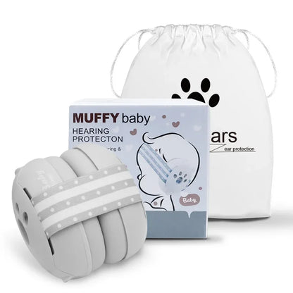 Baby wearing earmuffs comfortably while sleeping, ideal for noise reduction during naps.