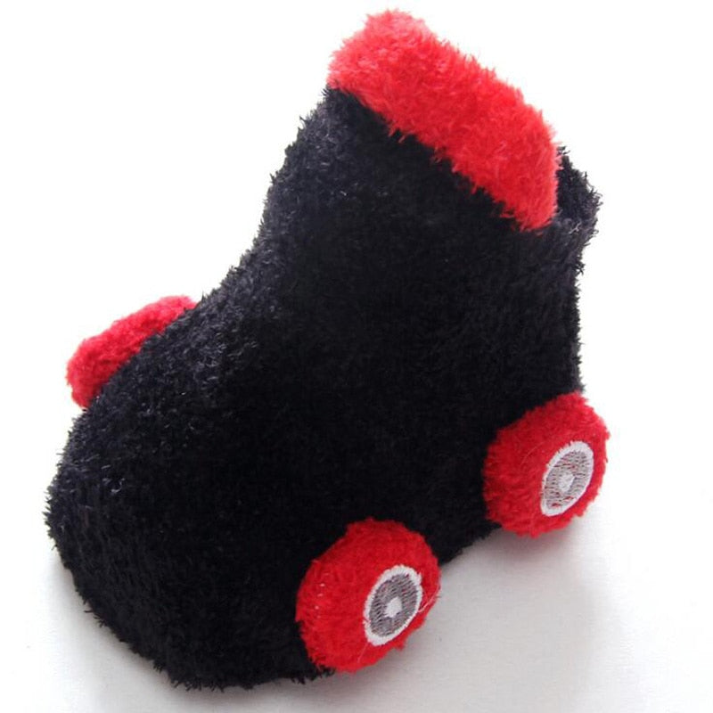 Infant non-slip socks with bold cartoon car patterns, essential baby footwear for home and play