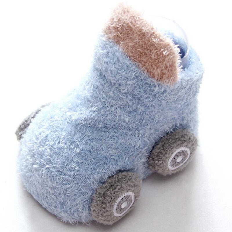 Soft baby anti-slip socks with cartoon car illustrations, providing secure footing for little ones