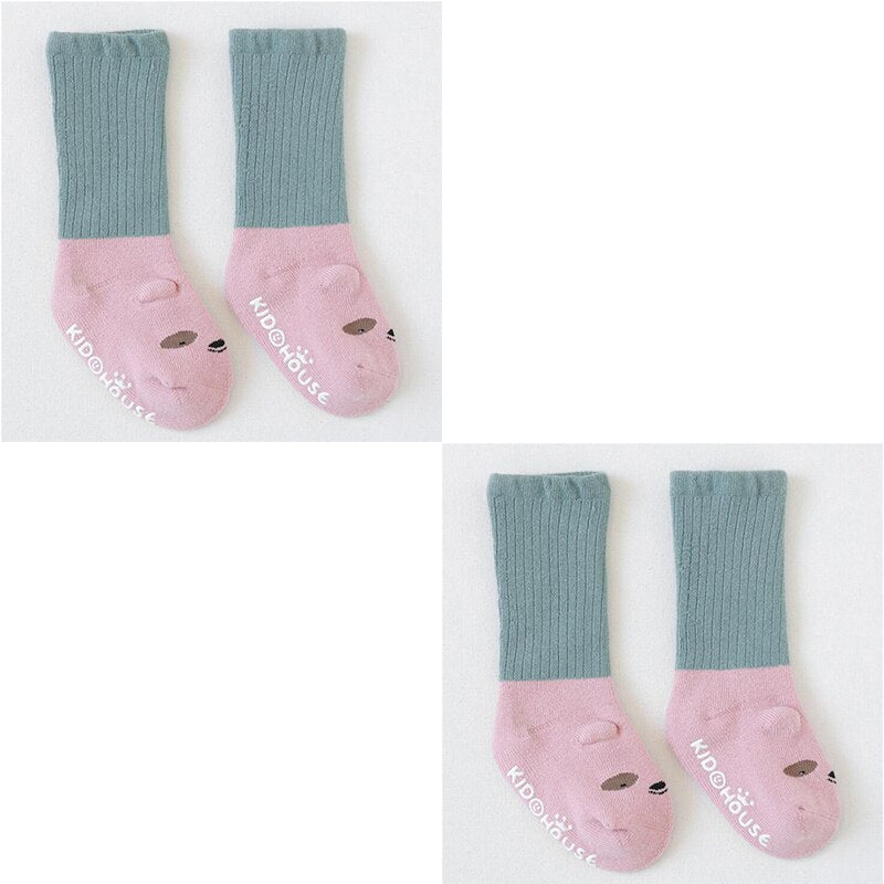 Warm cotton non-slip socks for babies, providing comfort and grip for little feet