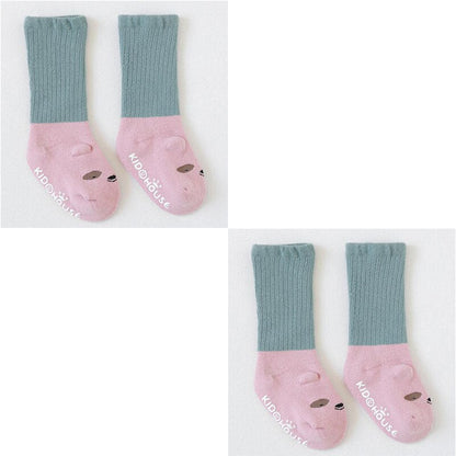 Warm cotton non-slip socks for babies, providing comfort and grip for little feet