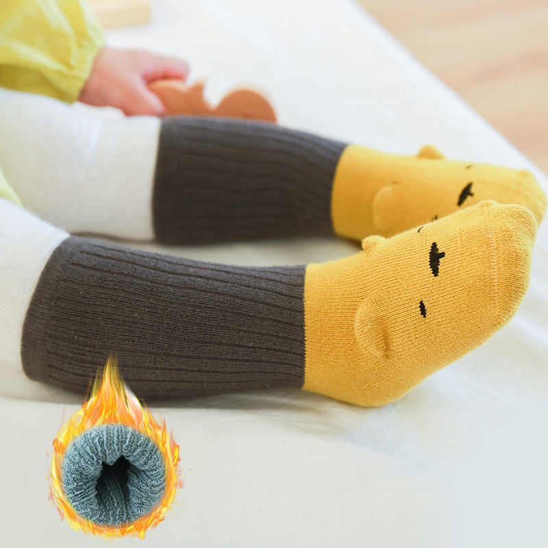 Soft non-slip cotton socks for toddlers, ensuring stable steps and warm feet