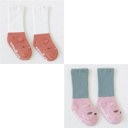 Close-up of a baby non-slip thermal cotton sock sole with grip dots for safety