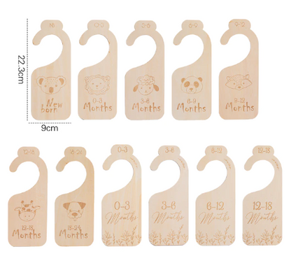 Collection of wooden baby closet dividers, cartoon animal theme, a practical nursery organization solution