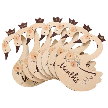 Set of wooden baby closet dividers with various cartoon animal designs for nursery organization