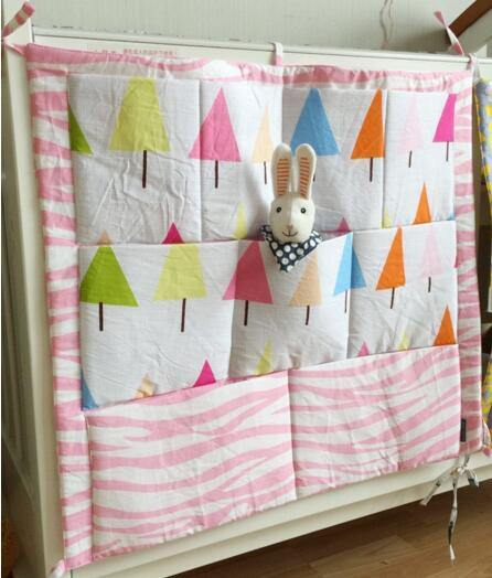 Thoughtful baby shower gift: versatile cotton crib organizer for nursery essentials.